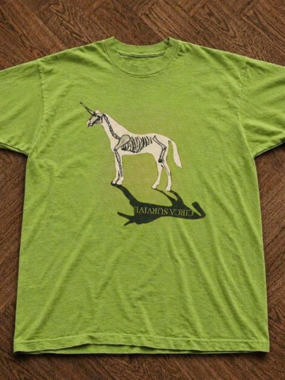 Green Graphic Tee - Skeletal Unicorn Design